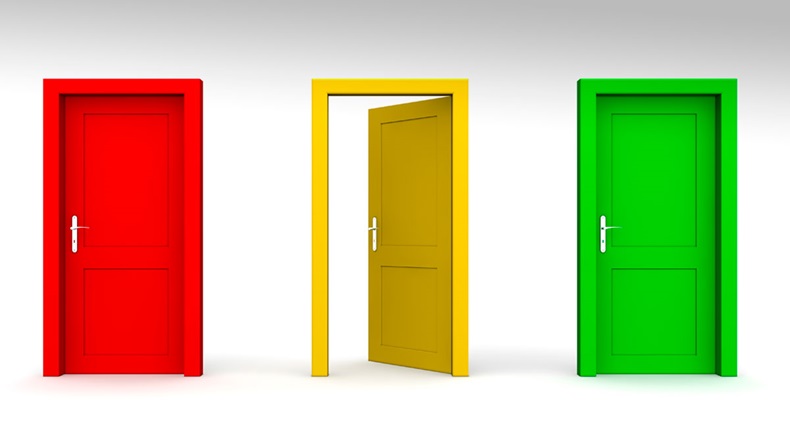 three doors in a a row - red, yellow, green - yellow door open