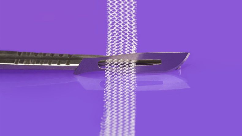 Surgical knife and tension-free vaginal tape on lilac background - Image 