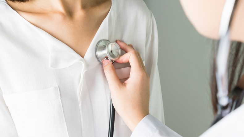 Doctor is using a stethoscope for patients patient examination. To hear the heart rate, For patients with heart disease. - Image 