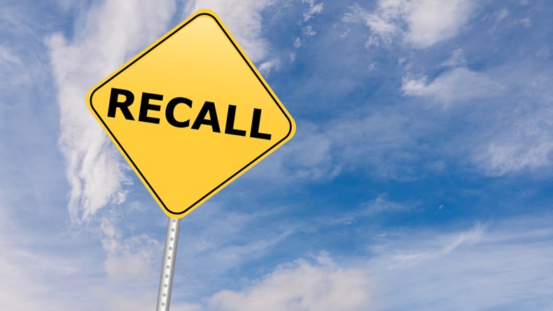 Recall Road Sign against sky - Image 