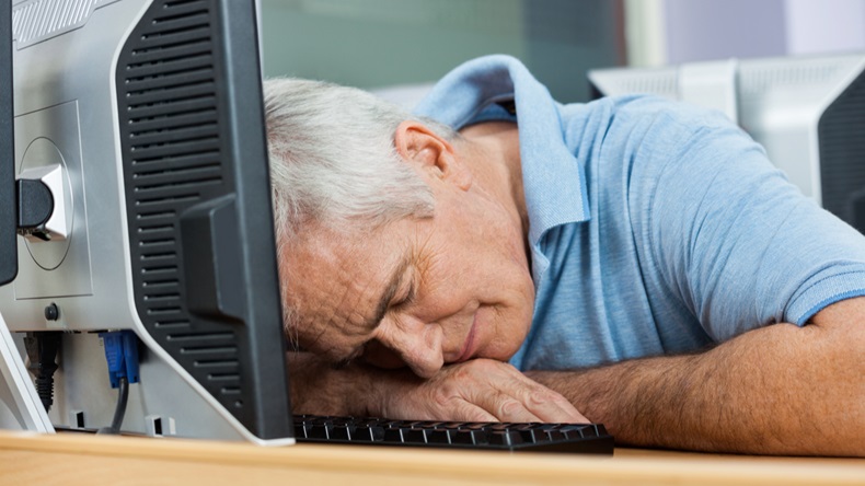sleeping-senior-man -computer