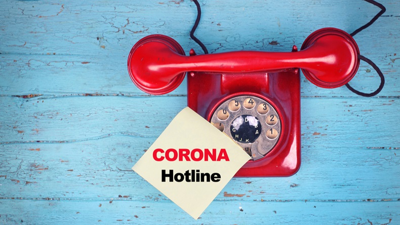 red phone hotline - calling for information about Coronavirus disease named COVID-19