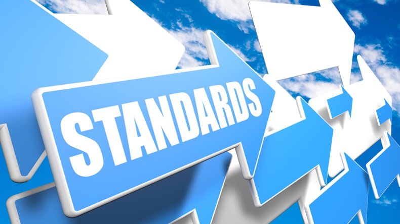 Blue arrows against a blue-sky background, with the word "Standards" written on one.