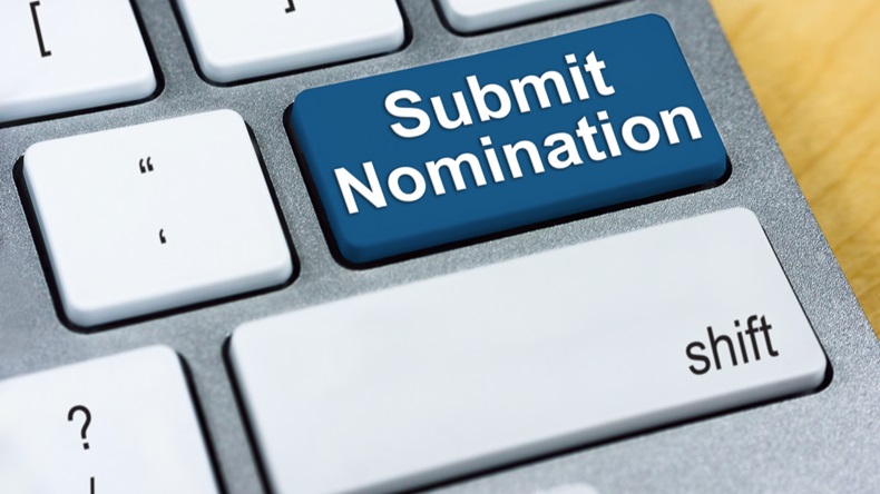 A computer keyboard with a blue key reading, "Submit nomination."