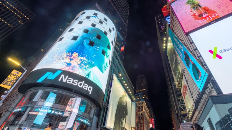 NASDAQ building in Time Square at night - Image ID: 2AF6DBG