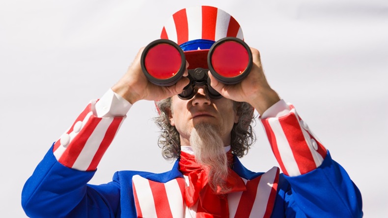 Uncle Sam looking through large binoculars