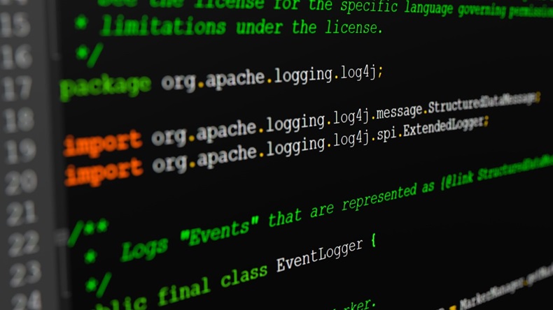 Java Source code of the log4j event logger framework on a screen in close-up with selective focus