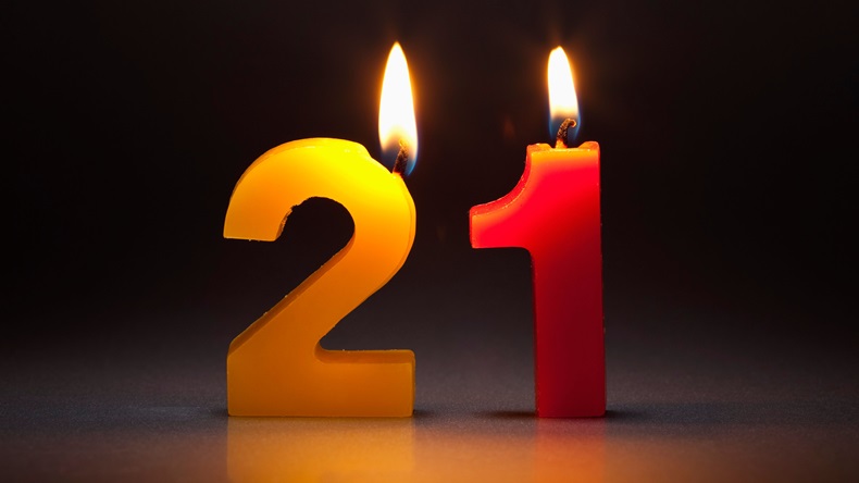 Two Candles In The Shape Of The Numbers 21.