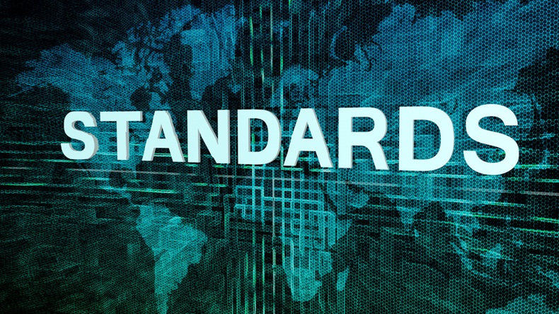 Standards text concept on green digital world map background 