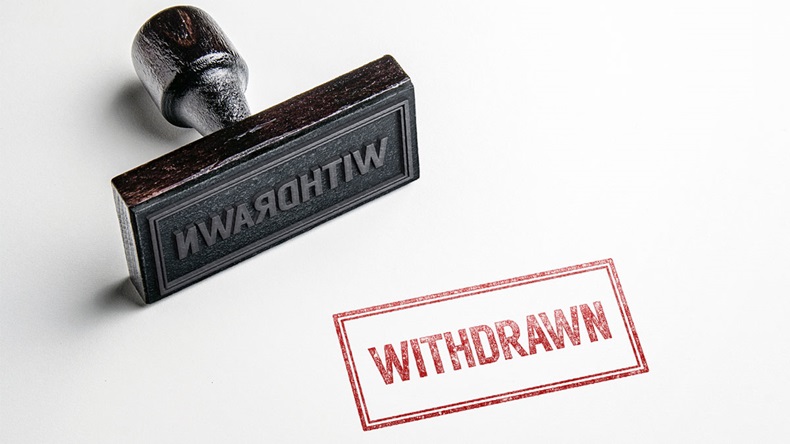 Rubber stamping that says 'Withdrawn'.